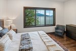 Upstairs is a second bedroom with Queen bed, luxury linens & waterfront views.